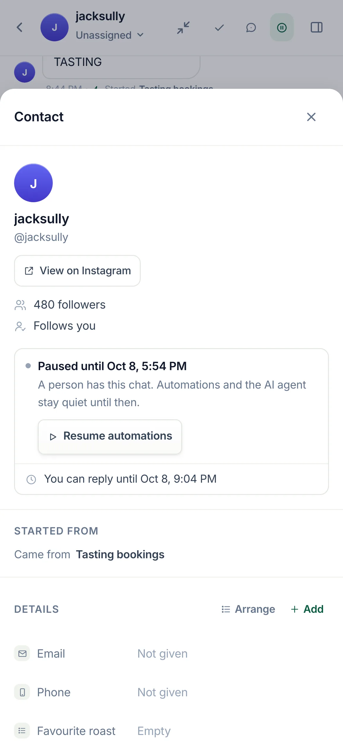 The Live inbox with jacksully’s chat: the automation’s messages marked, and the contact panel showing Paused until, with its time, and Resume automations.