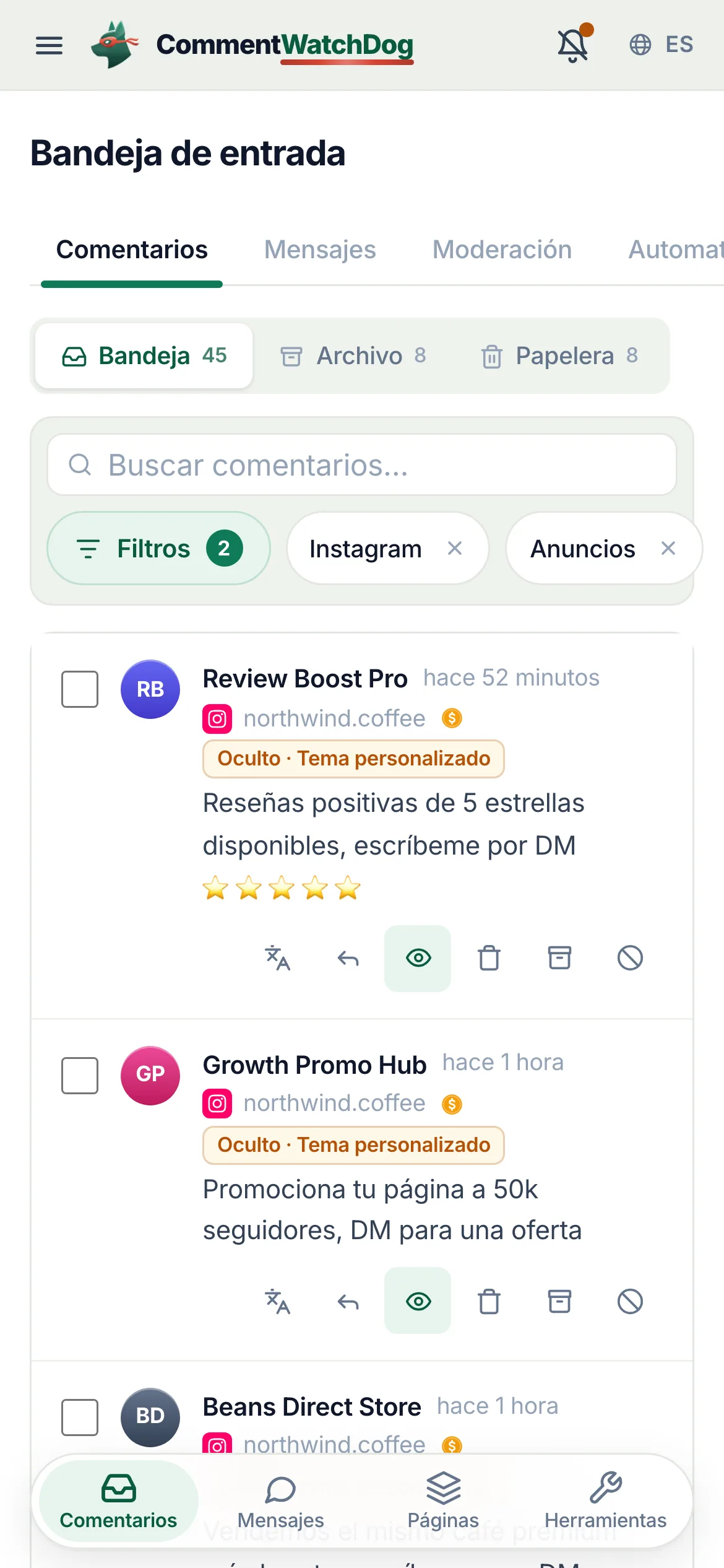 La bandeja de entrada de CommentWatchDog en la cuenta de Instagram, filtrada por comentarios en anuncios: las etiquetas de oculto indican su regla y dos preguntas reales esperan respuesta.